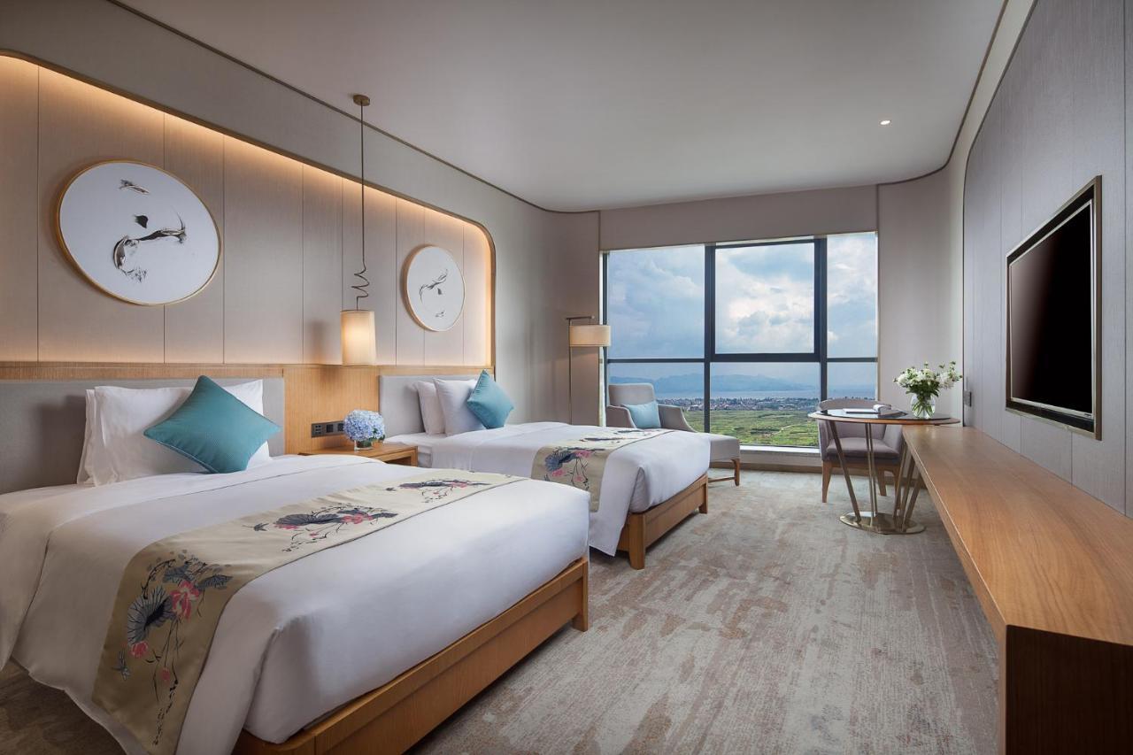 รามาดา พลาซา ฟูเทียน เลค Hotel Chengjiang  ภายนอก รูปภาพ