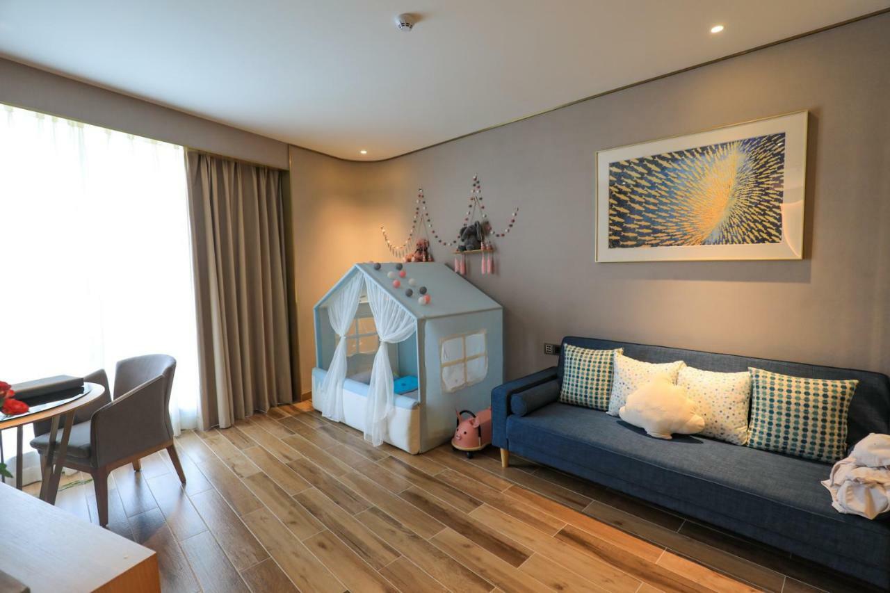 รามาดา พลาซา ฟูเทียน เลค Hotel Chengjiang  ภายนอก รูปภาพ