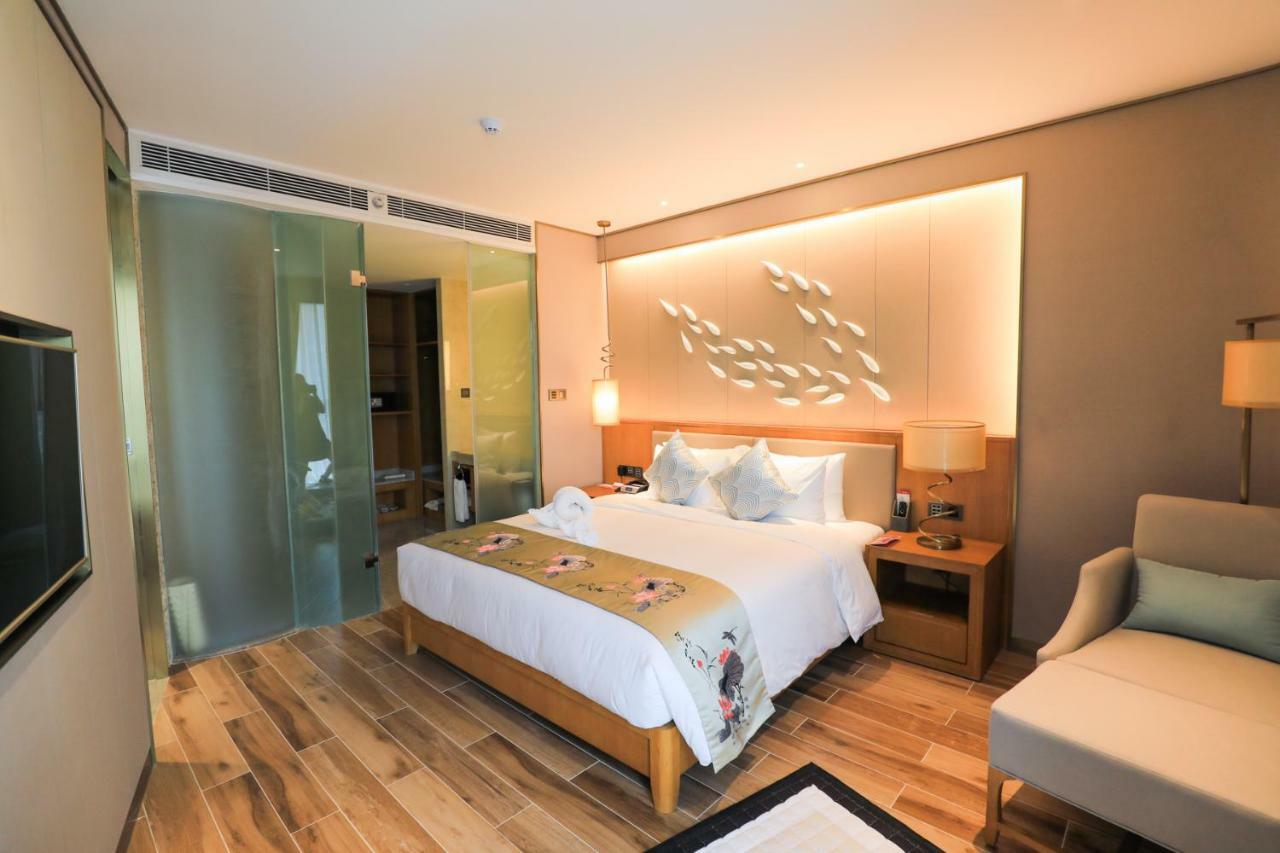 รามาดา พลาซา ฟูเทียน เลค Hotel Chengjiang  ภายนอก รูปภาพ