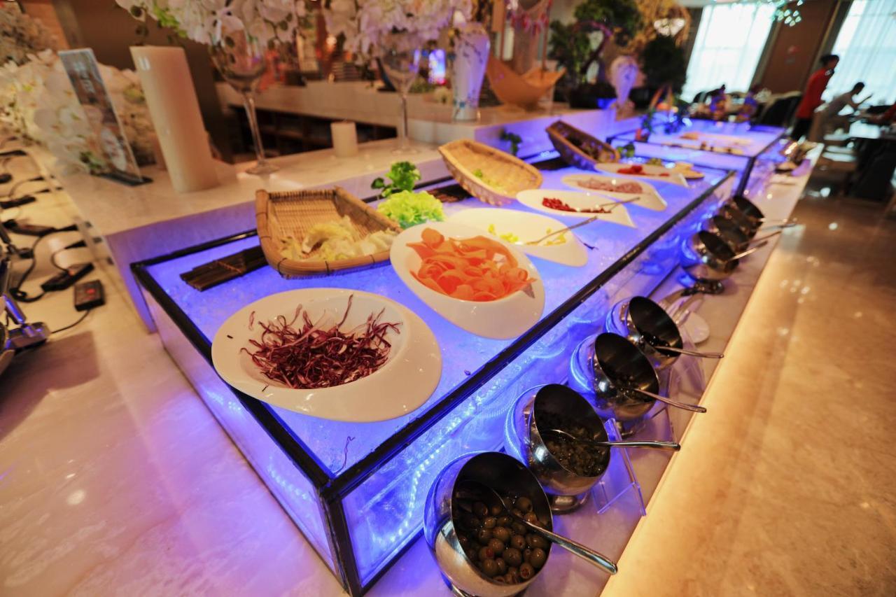 รามาดา พลาซา ฟูเทียน เลค Hotel Chengjiang  ภายนอก รูปภาพ