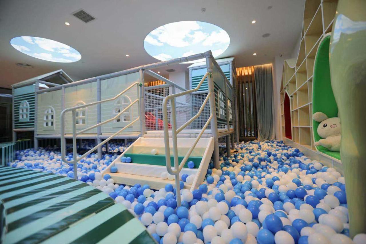 รามาดา พลาซา ฟูเทียน เลค Hotel Chengjiang  ภายนอก รูปภาพ